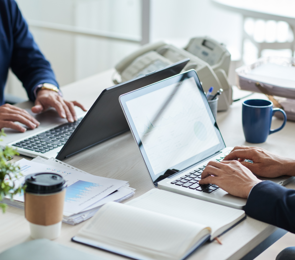 side-view-cropped-unrecognizable-business-people-working-common-desk